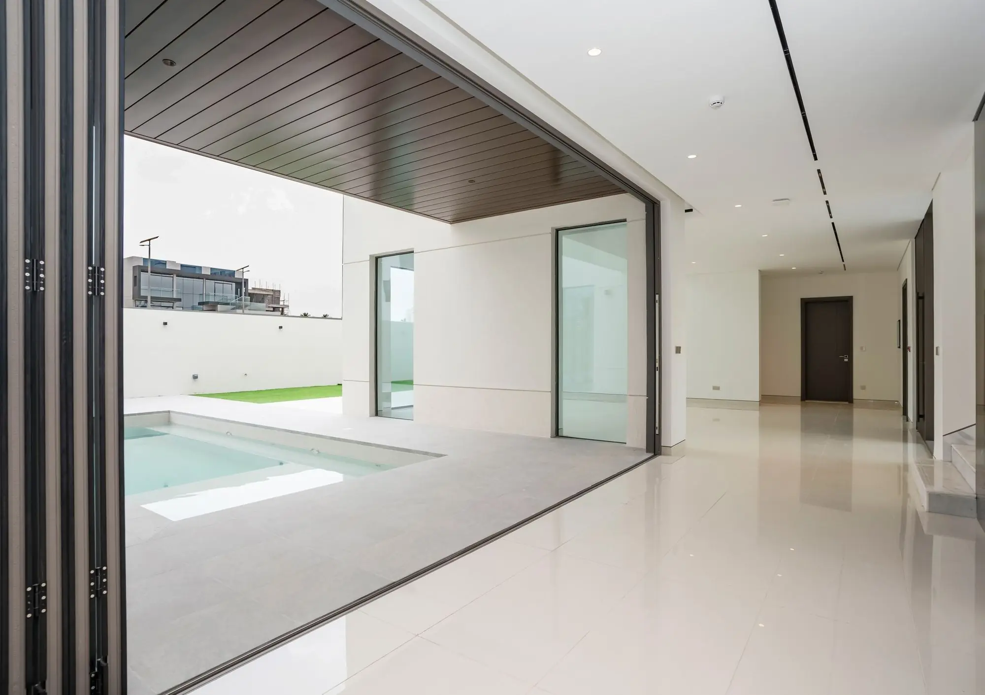 Villa Treize, Furjan West, Dubai: Living, pool view